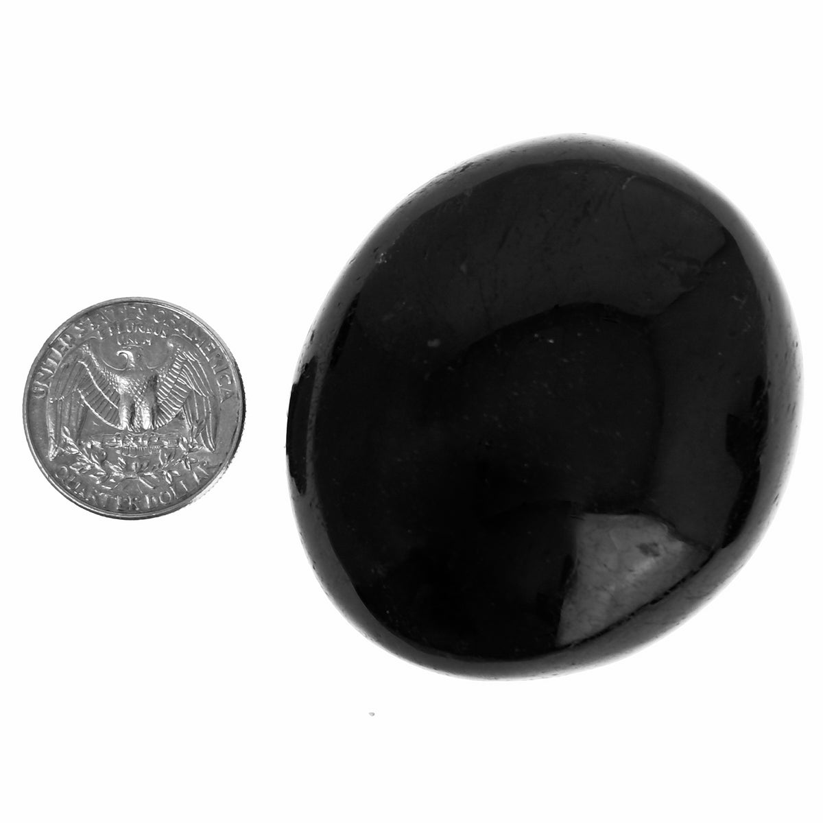 Black Tourmaline palm stone, a tourmaline group mineral, from Madagascar.