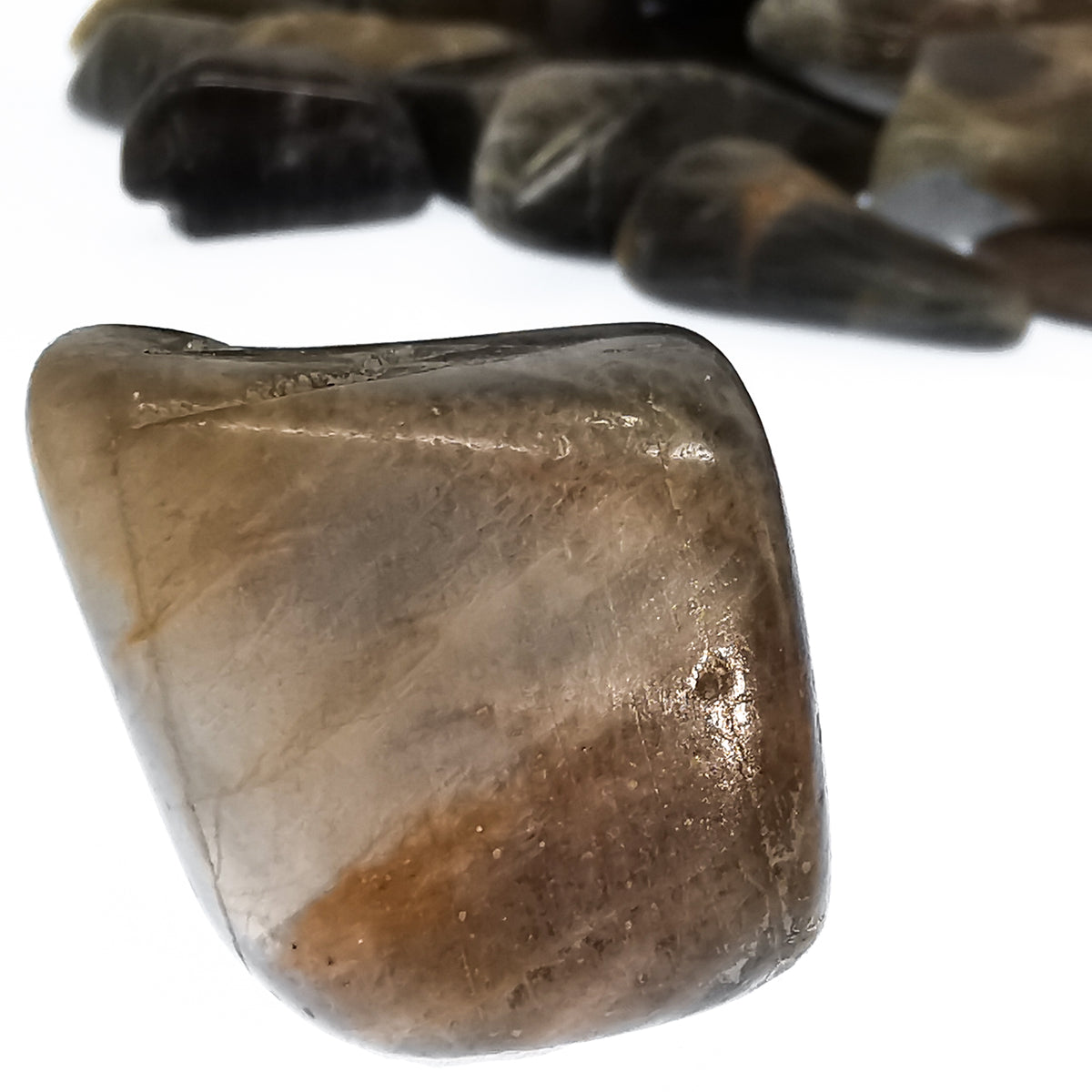 Black Moonstone tumble, a feldspar, from Madagascar.