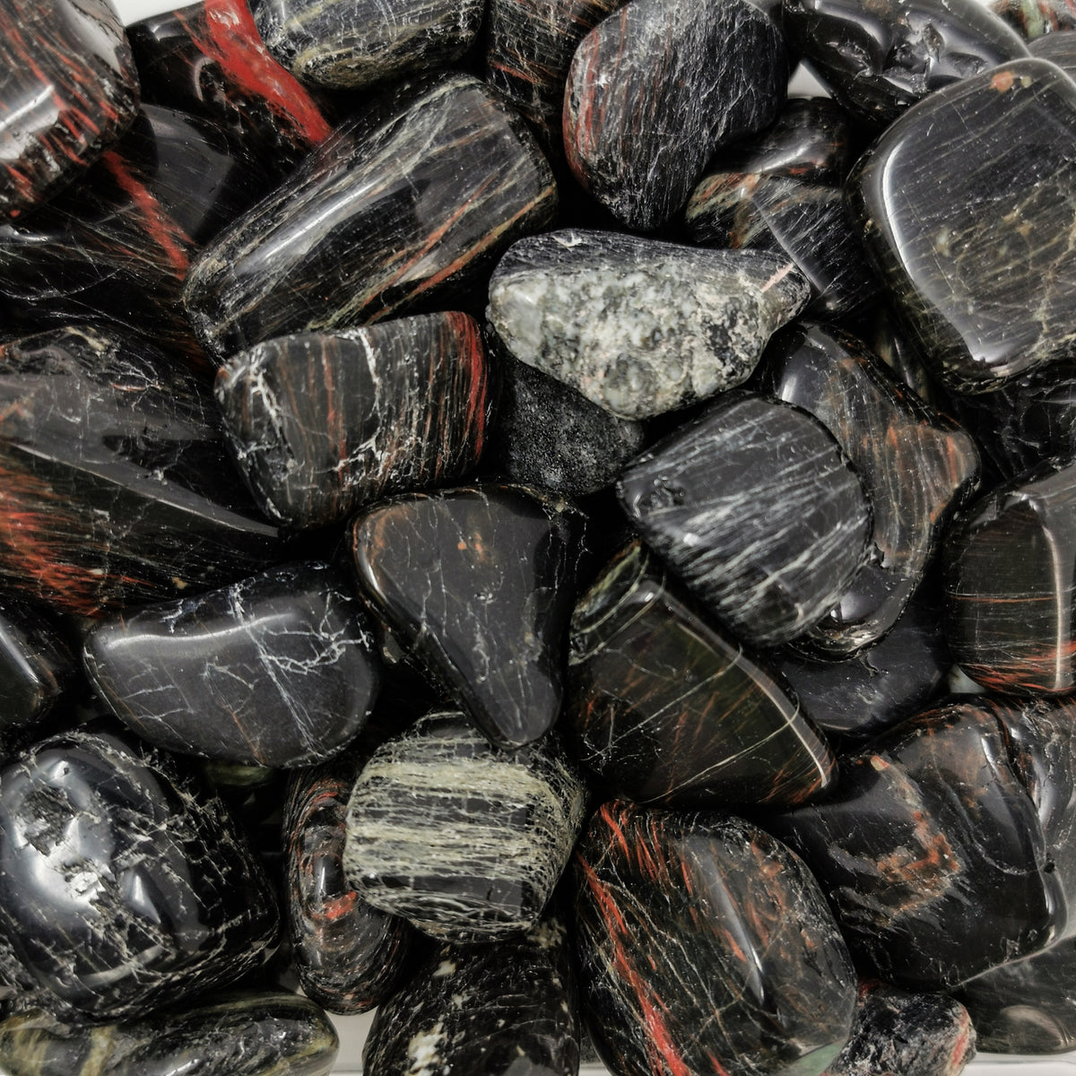 Black Tourmaline B-grade tumble, a tourmaline group mineral, from Brazil.