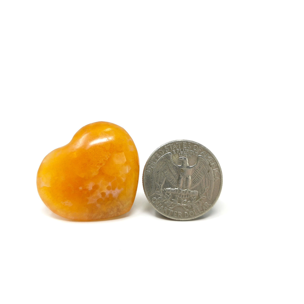 Carnelian heart, a variety of chalcedony, from Madagascar.