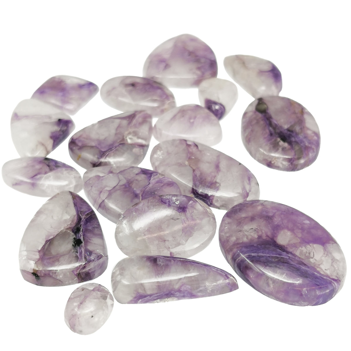 Charoite in Quartz cabochon from Russia.
