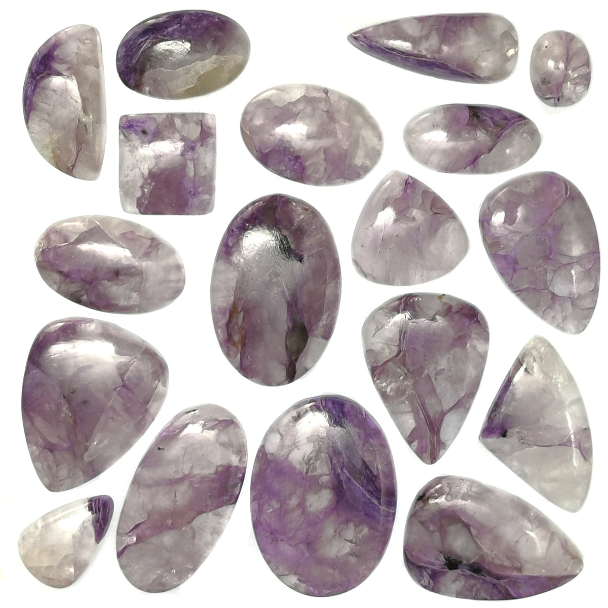 Charoite in Quartz cabochon from Russia.