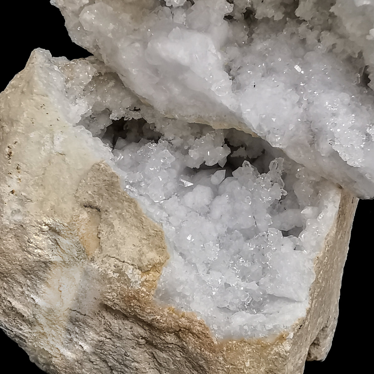 Cracked quartz geode pair from Morocco – crystal lining, close view