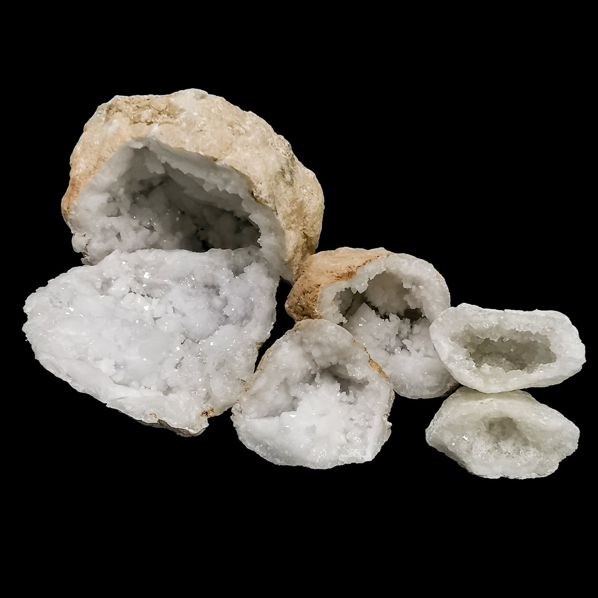 Cracked quartz geode pair from Morocco – group of pairs