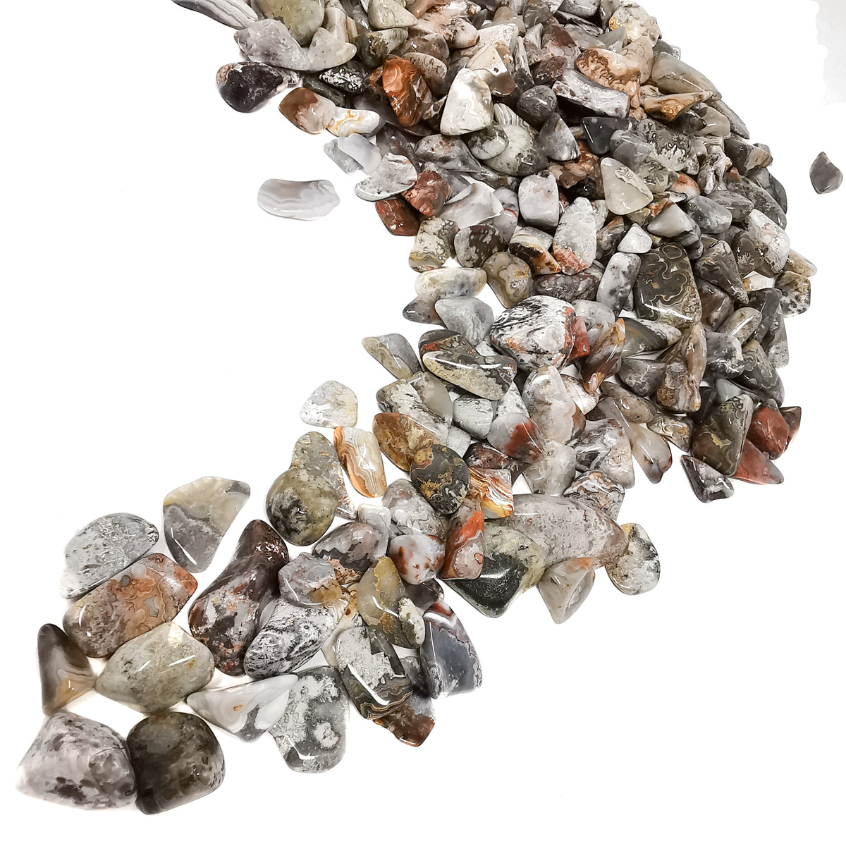 Crazy Lace Agate tumble, a variety of chalcedony, from Mexico.