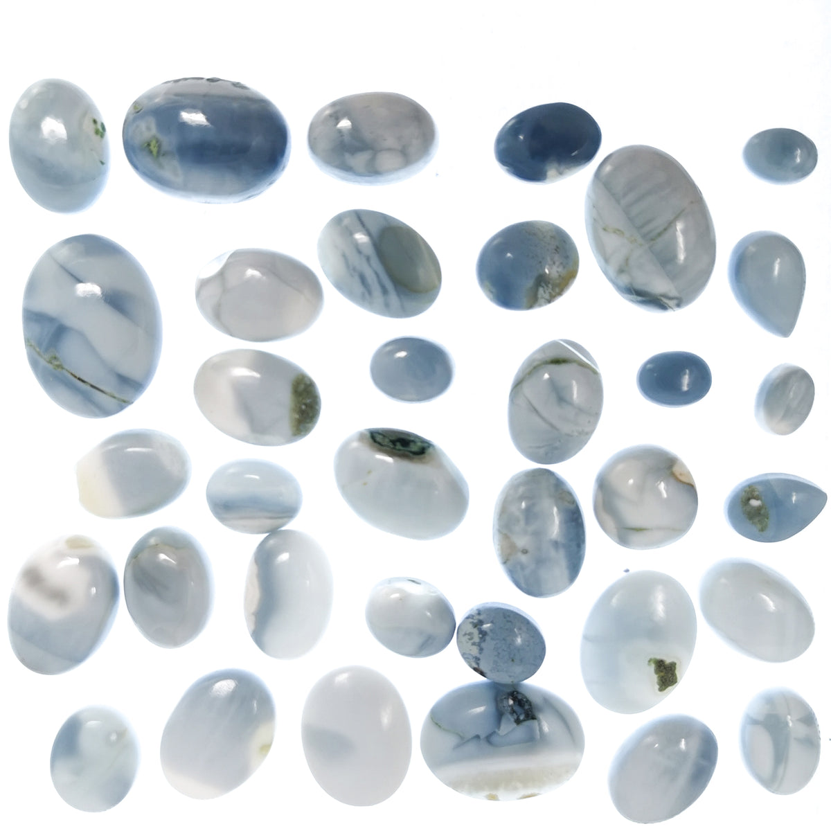 Denim blue opal cabochon from Oregon – rows of cabochons