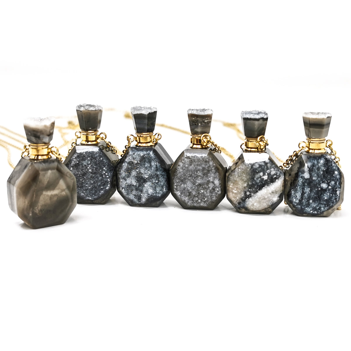 Quartz Druzy perfume bottle pendant in gold- or silver-plated base metal.