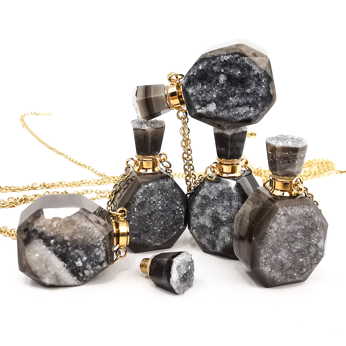 Quartz Druzy perfume bottle pendant in gold- or silver-plated base metal.