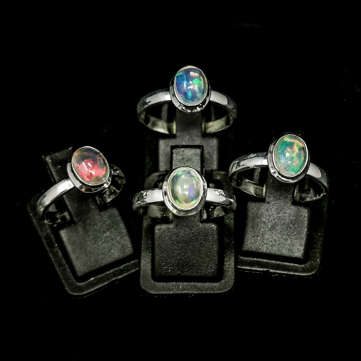 Ethiopian Opal Dished ring in sterling silver.