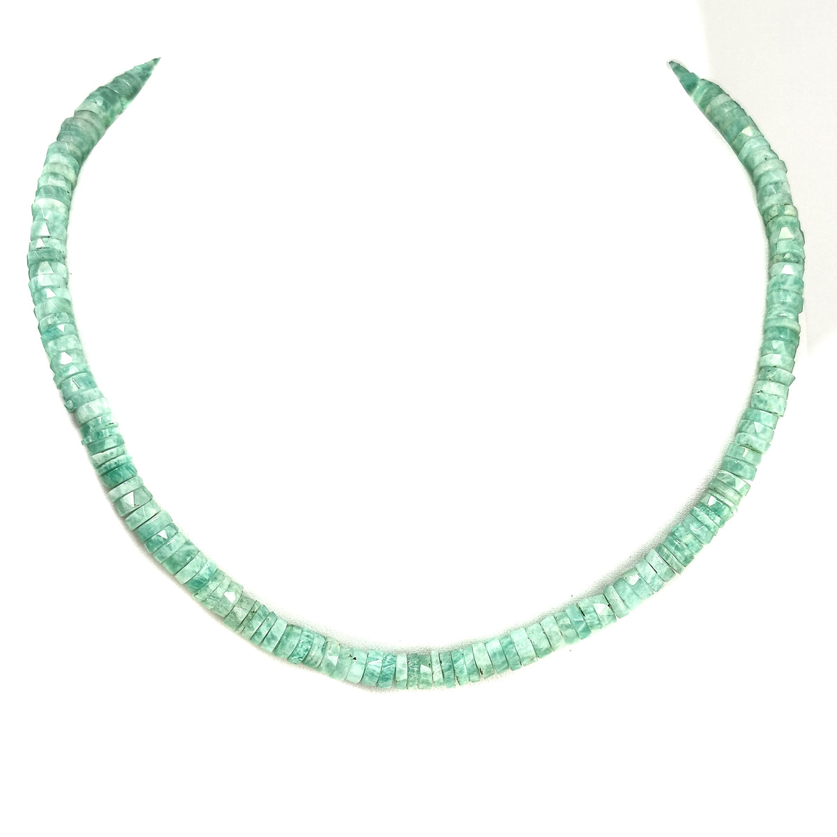 Wheel Shape facet bead necklace in sterling silver and steel wire.