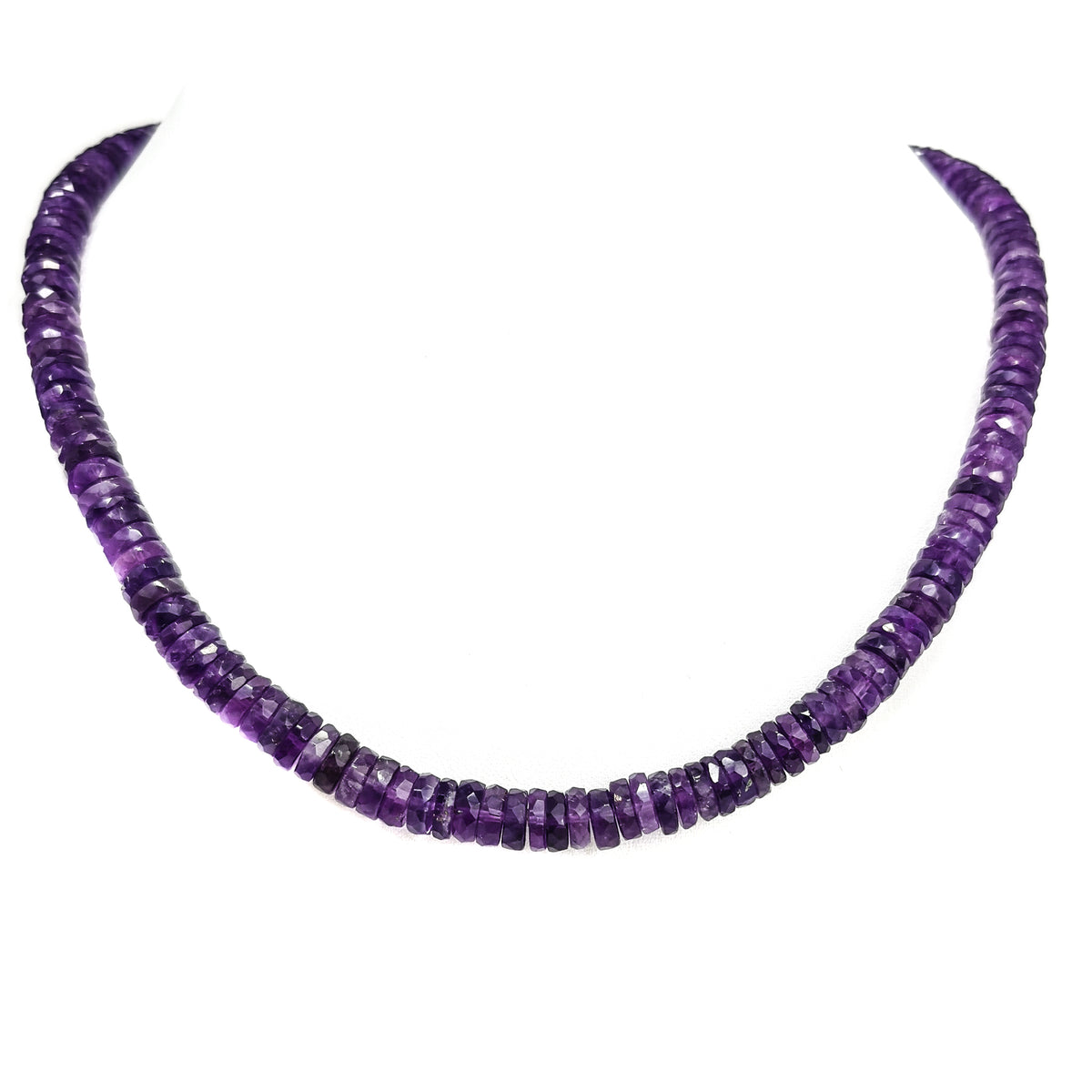 Wheel Shape facet bead necklace in sterling silver and steel wire.