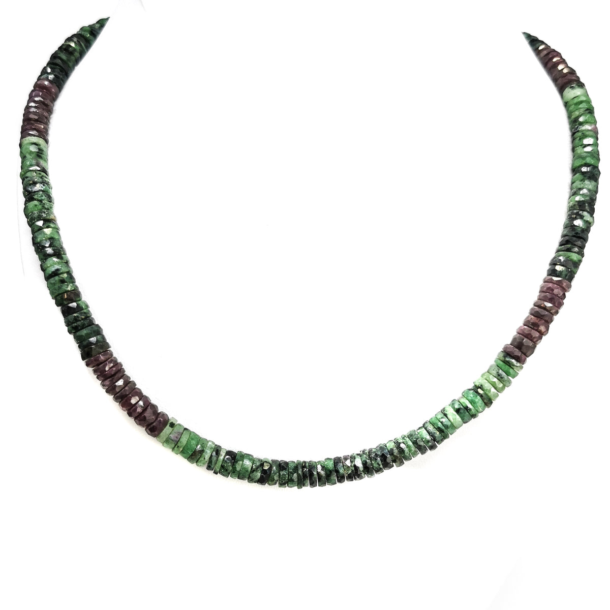 Wheel Shape facet bead necklace in sterling silver and steel wire.
