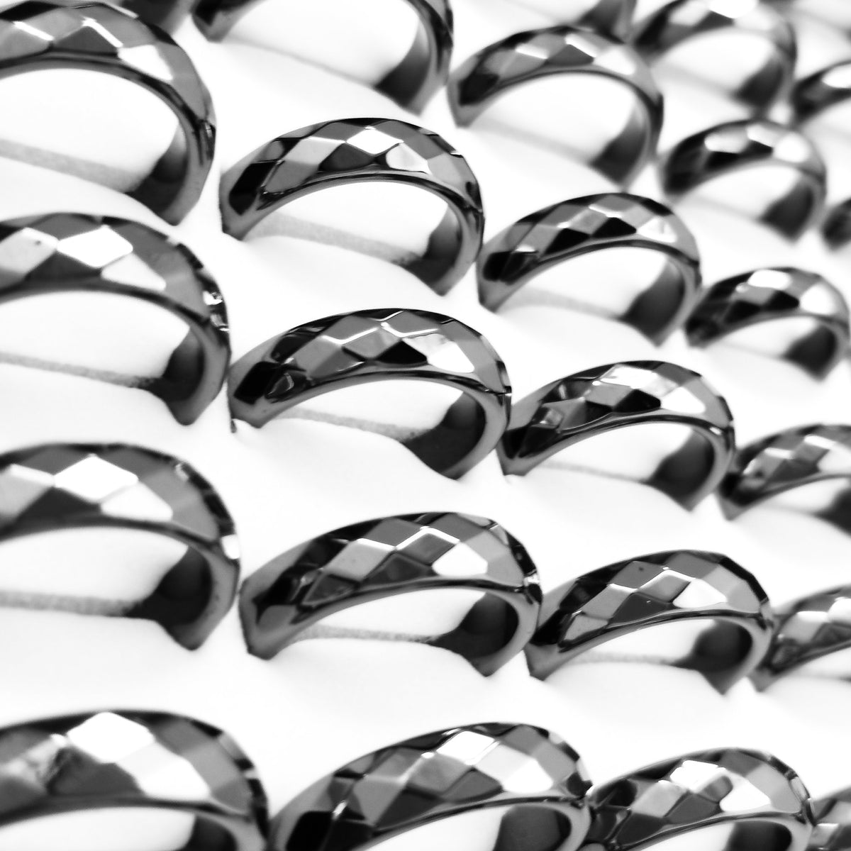 Faceted hematite stone ring – rows of rings