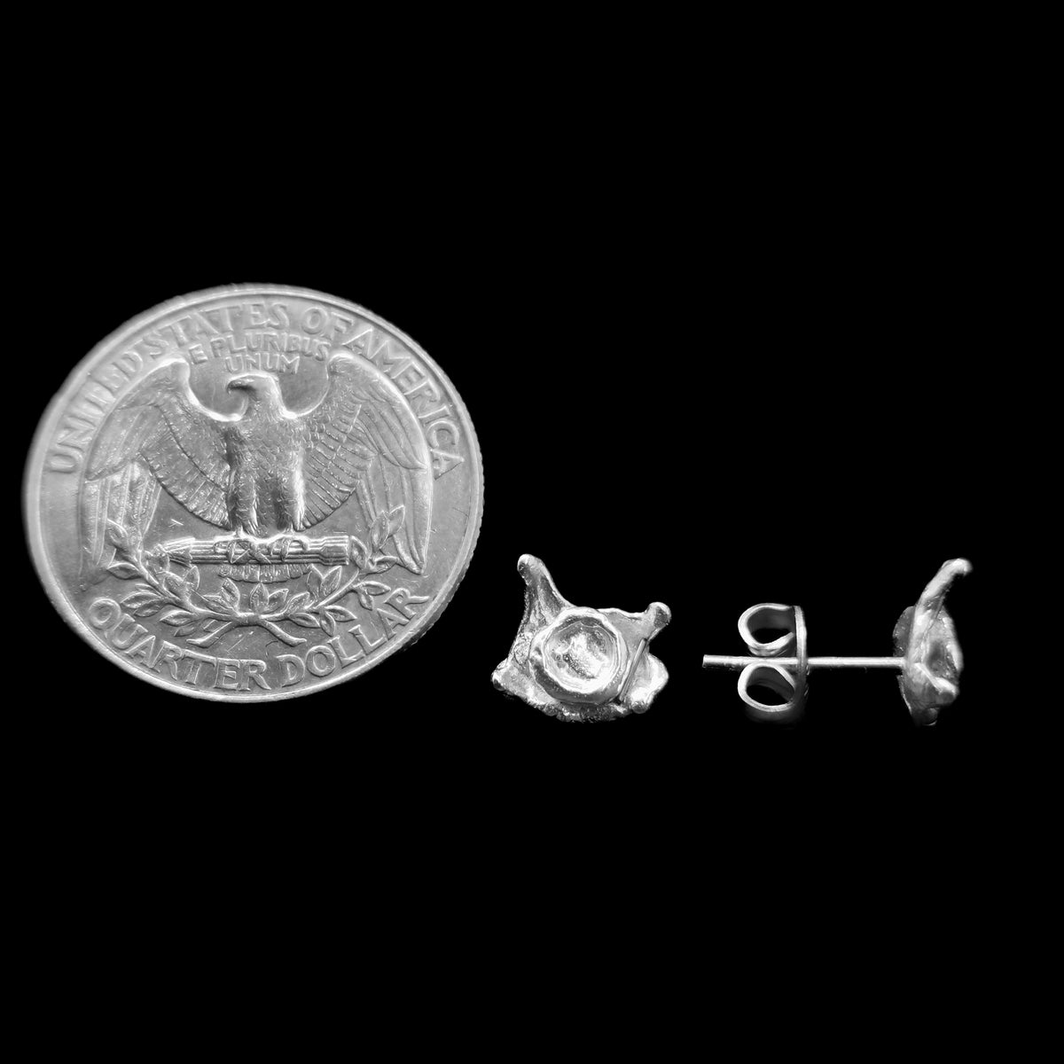 Gob stud earring in sterling silver.
