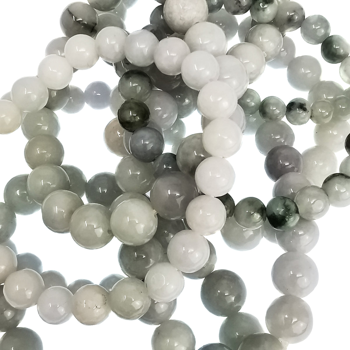 Jadeite blanche bead bracelet: pile of bracelets
