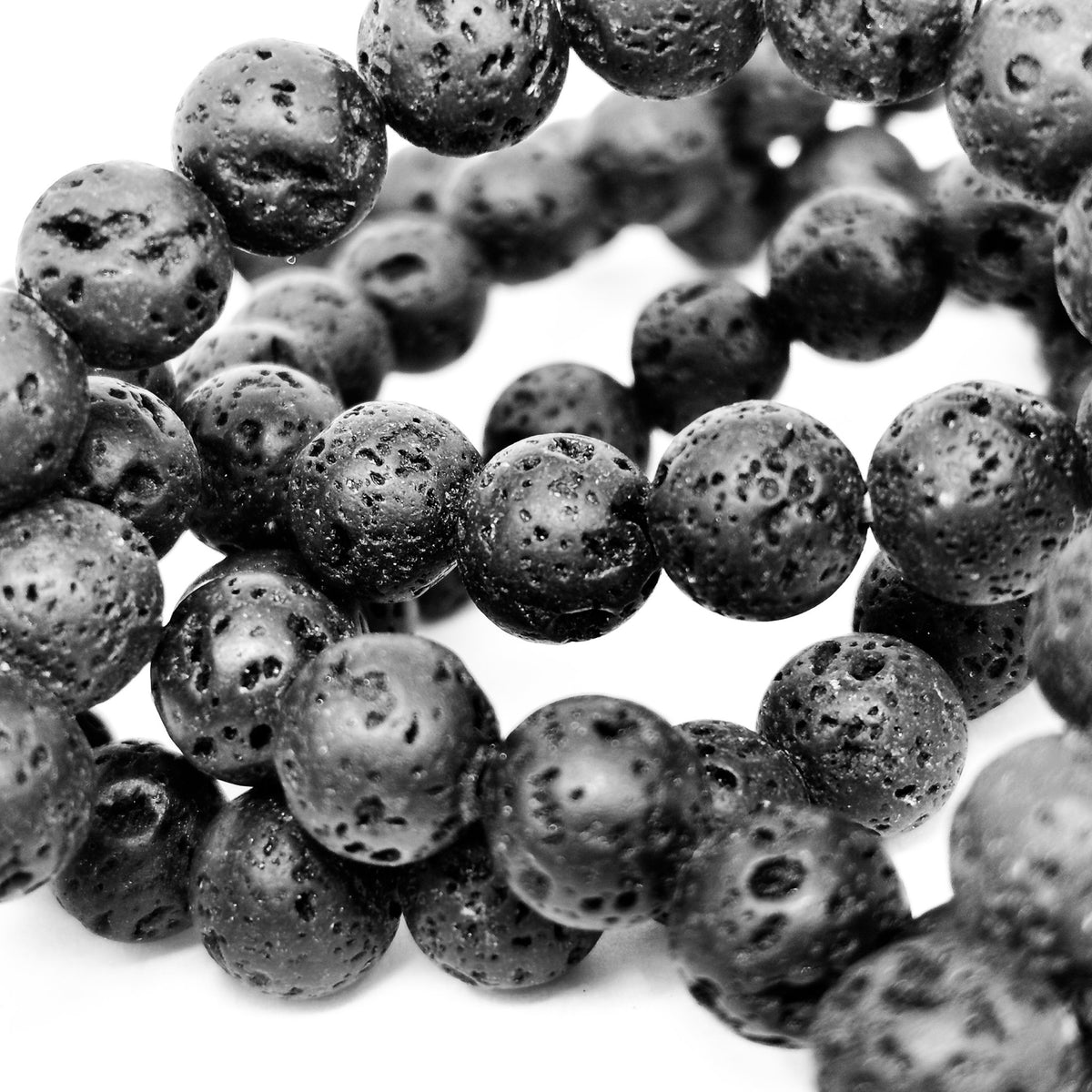 Lava stone bracelet: close view of pitted bead surfaces
