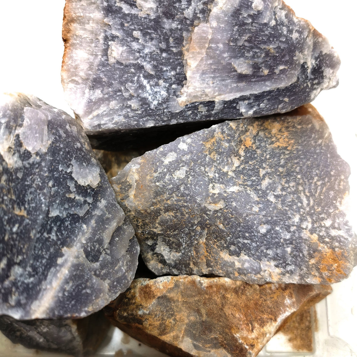 Lavender (Yttrium) Fluorite rough, calcium fluoride, from Sonora, Mexico.