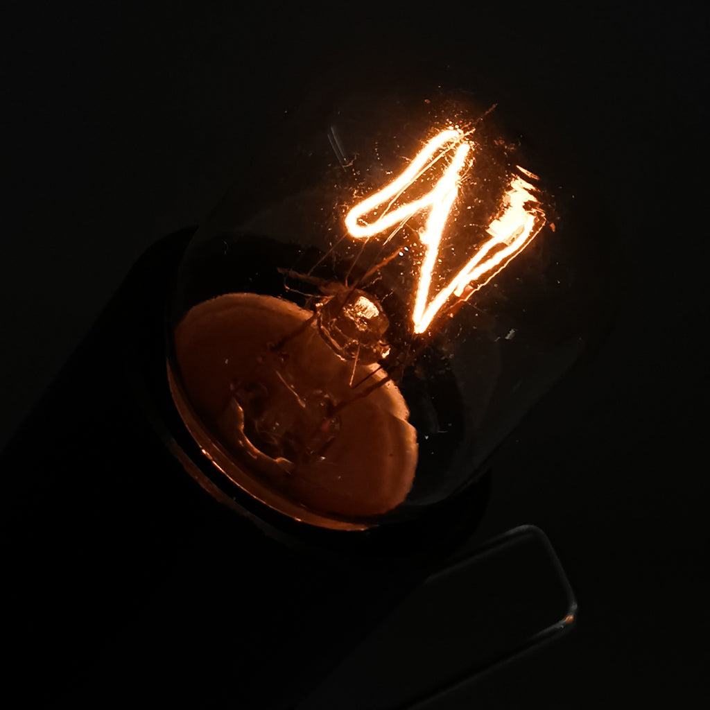 Light Bulb (Salt Lamp), made of glass.