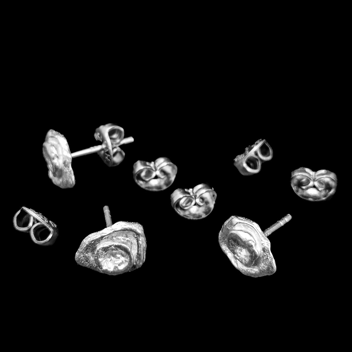 Melties stud earring in sterling silver.