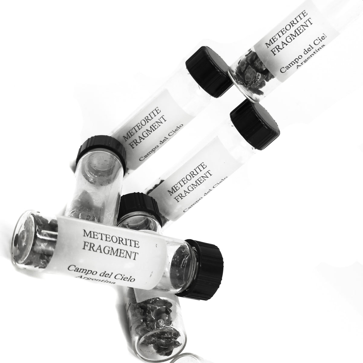 Meteorite Fragments in vial specimen from Campo del Cielo, Argentina.