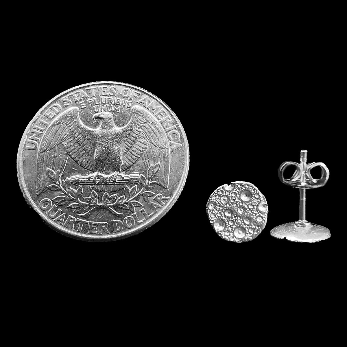 Moon earring in sterling silver.
