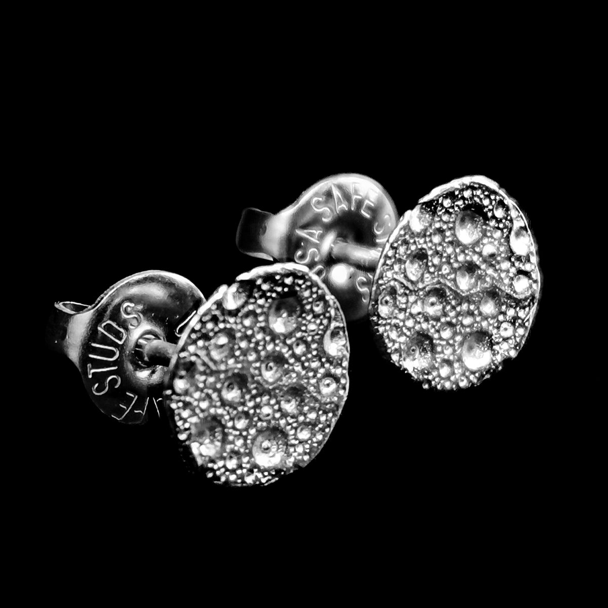 Moon earring in sterling silver.