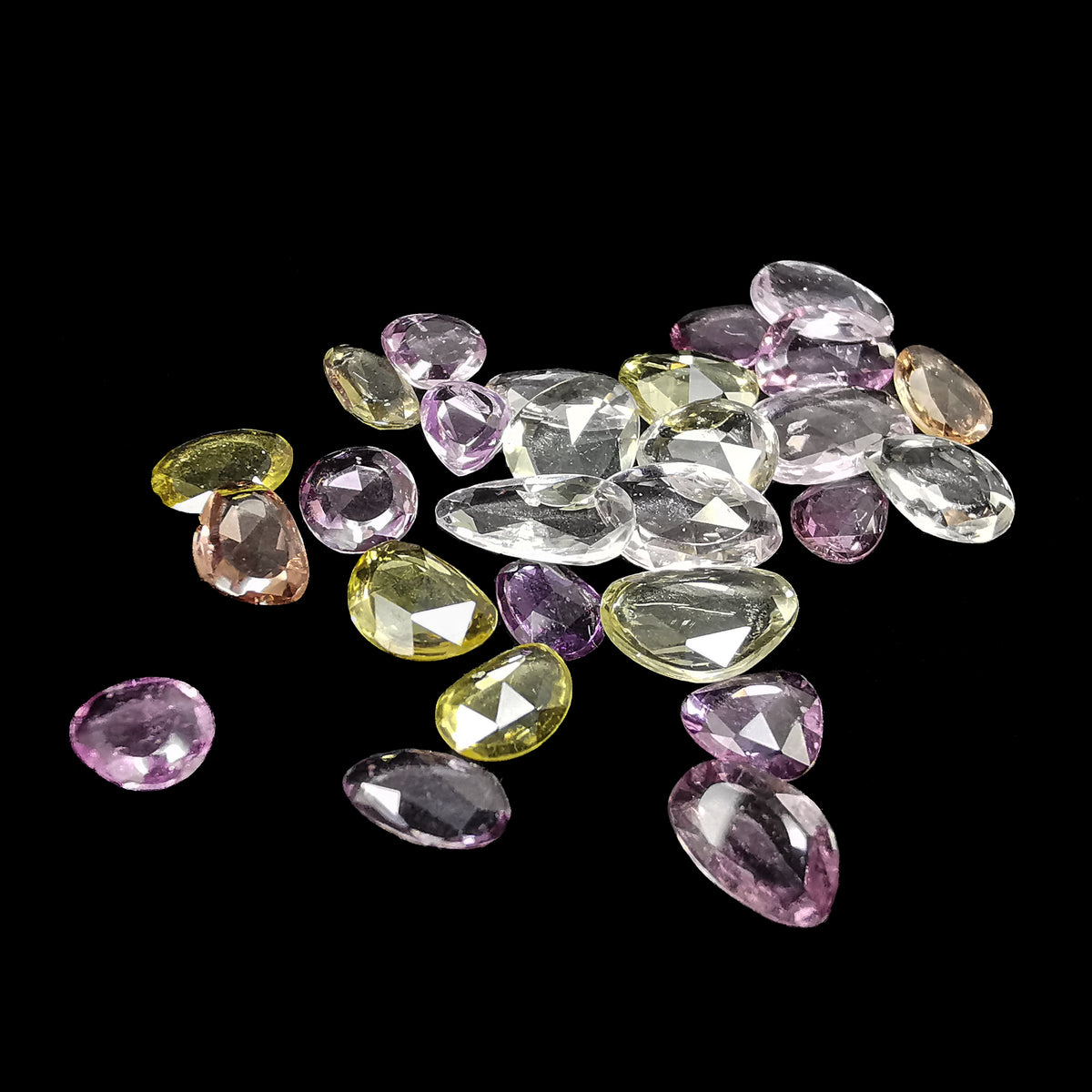 Multi Coloured Sapphire rose cut, a variety of corundum.