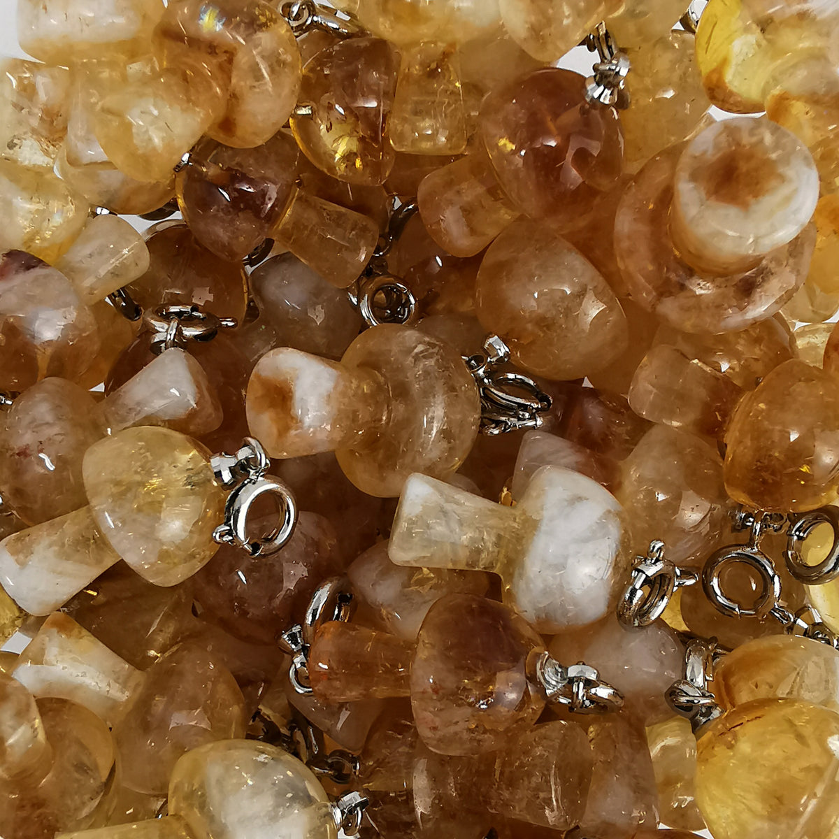 Mini mushroom charm – pile of citrine charms