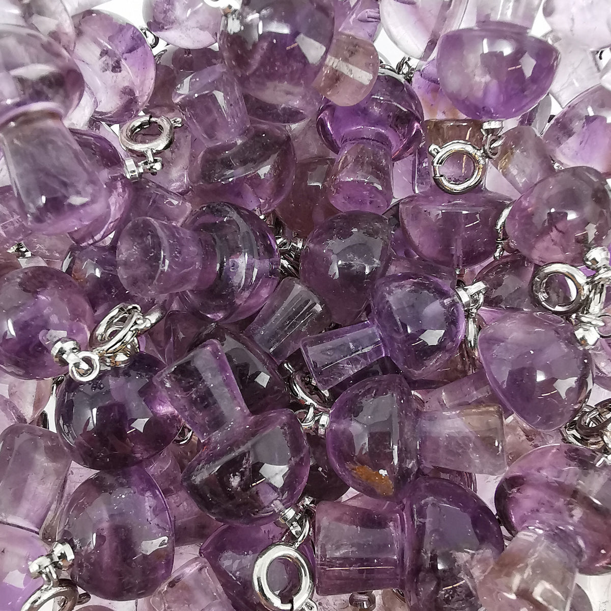 Mini mushroom charm – pile of amethyst charms