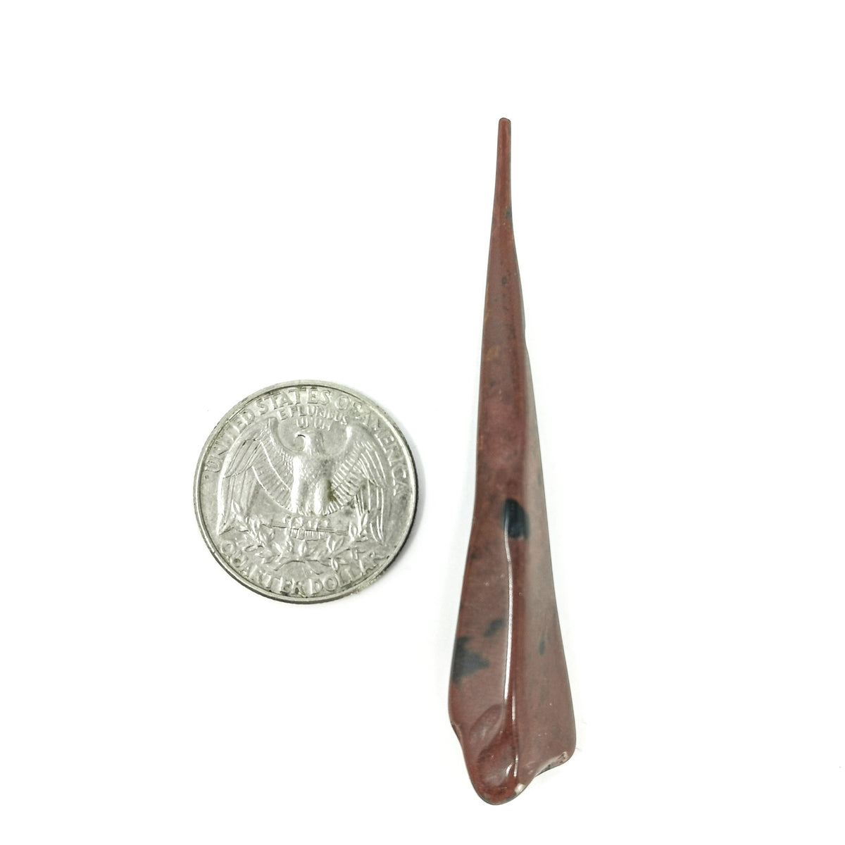 Obsidian Needle polished, a volcanic glass.