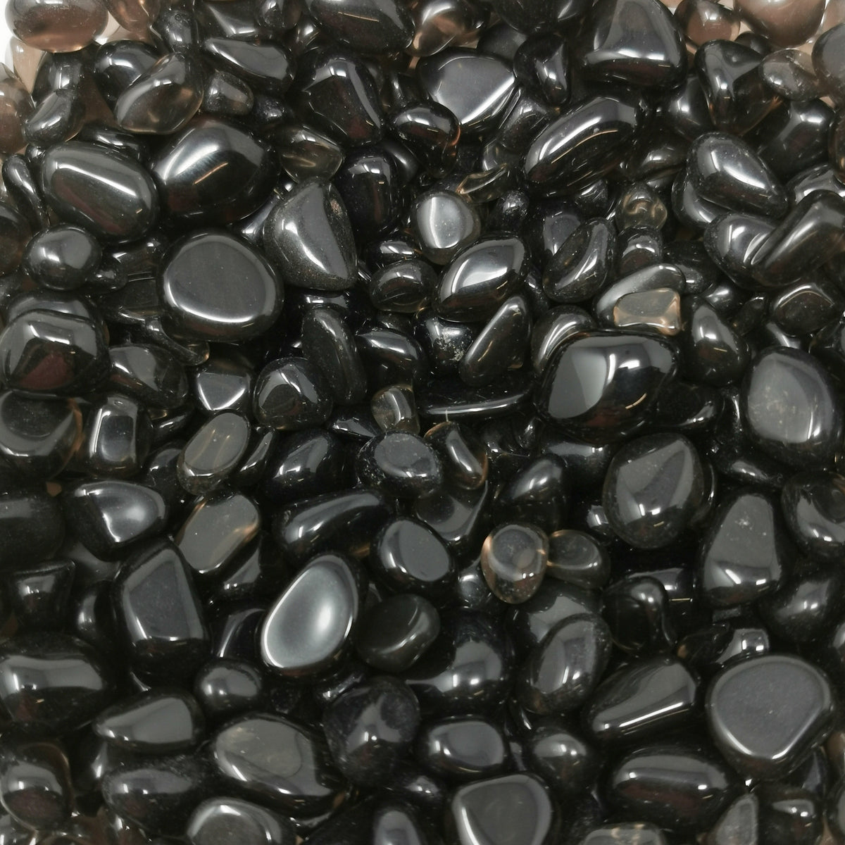 Obsidian tumble, a volcanic glass, from Arizona, USA.