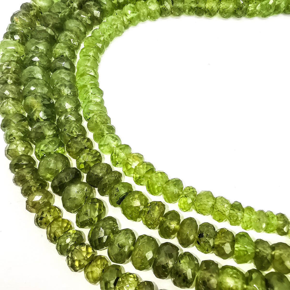 Peridot large facet bead necklace in sterling silver and steel wire.