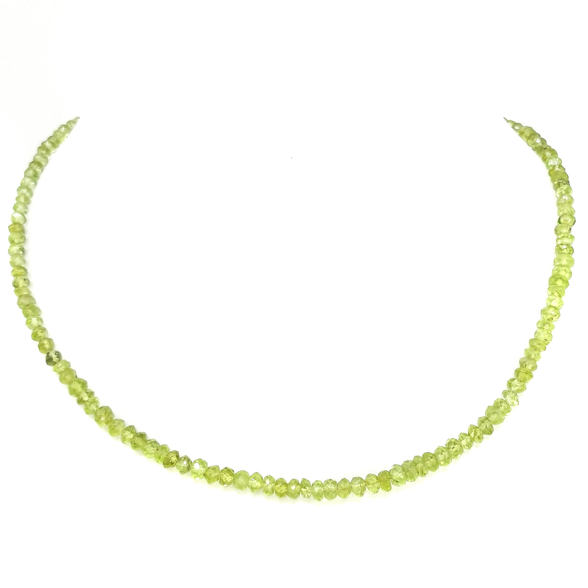 Peridot small facet bead necklace in sterling silver and steel wire.