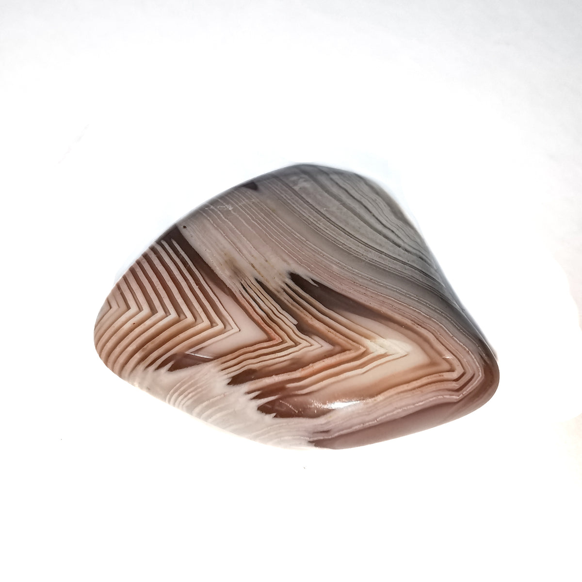 Pink Botswana Agate tumble, a variety of chalcedony, from Botswana.