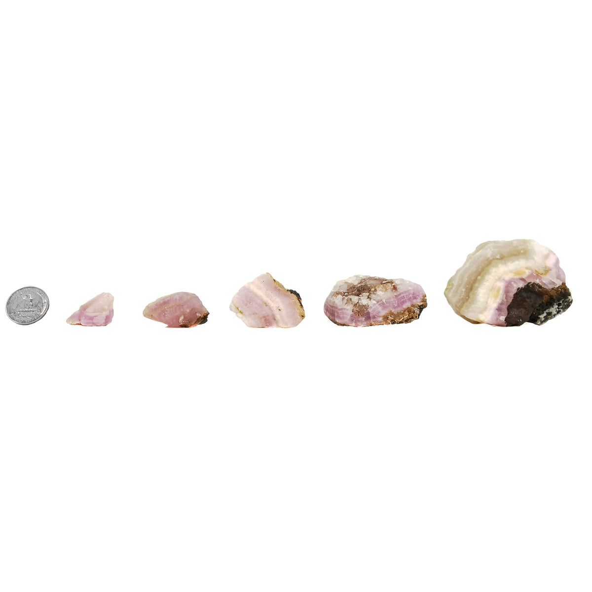 Pink calcite, Pakistan: sizes beside a coin for scale