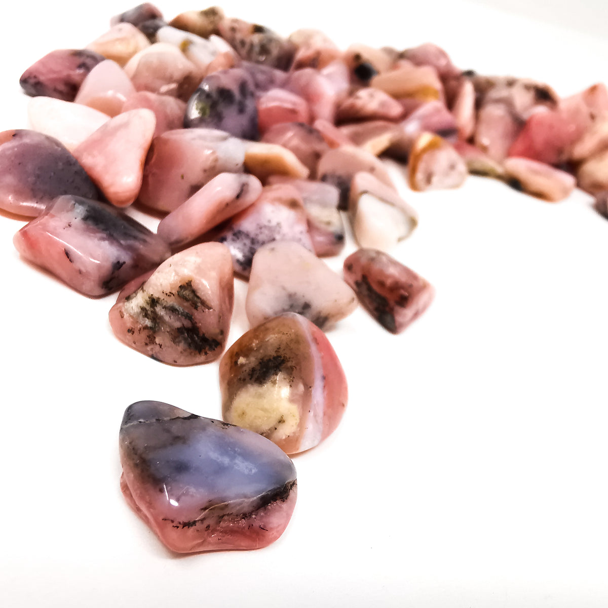 Peruvian Pink Opal tumble, hydrated silica, from Acari Mine, Caraveli Province, Arequipa, Peru.