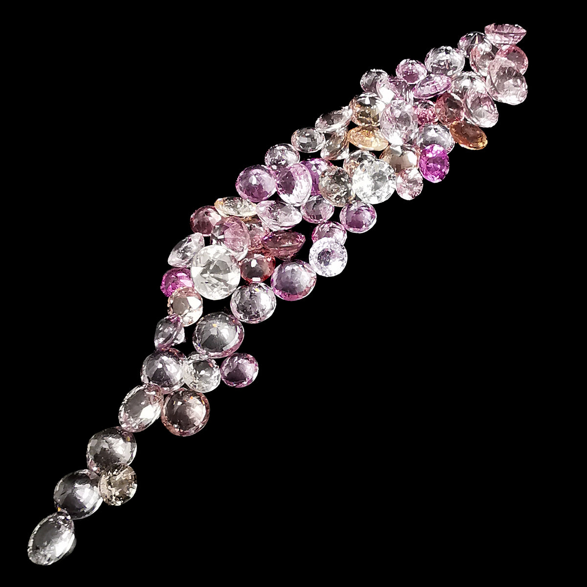 Pink Sapphire facet, a variety of corundum.