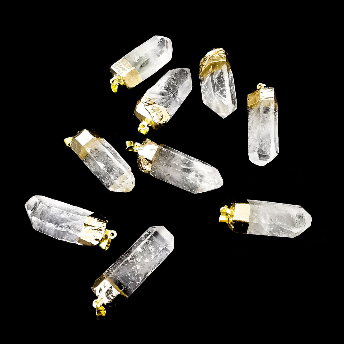 Raw clear quartz point pendant – spread of pendants