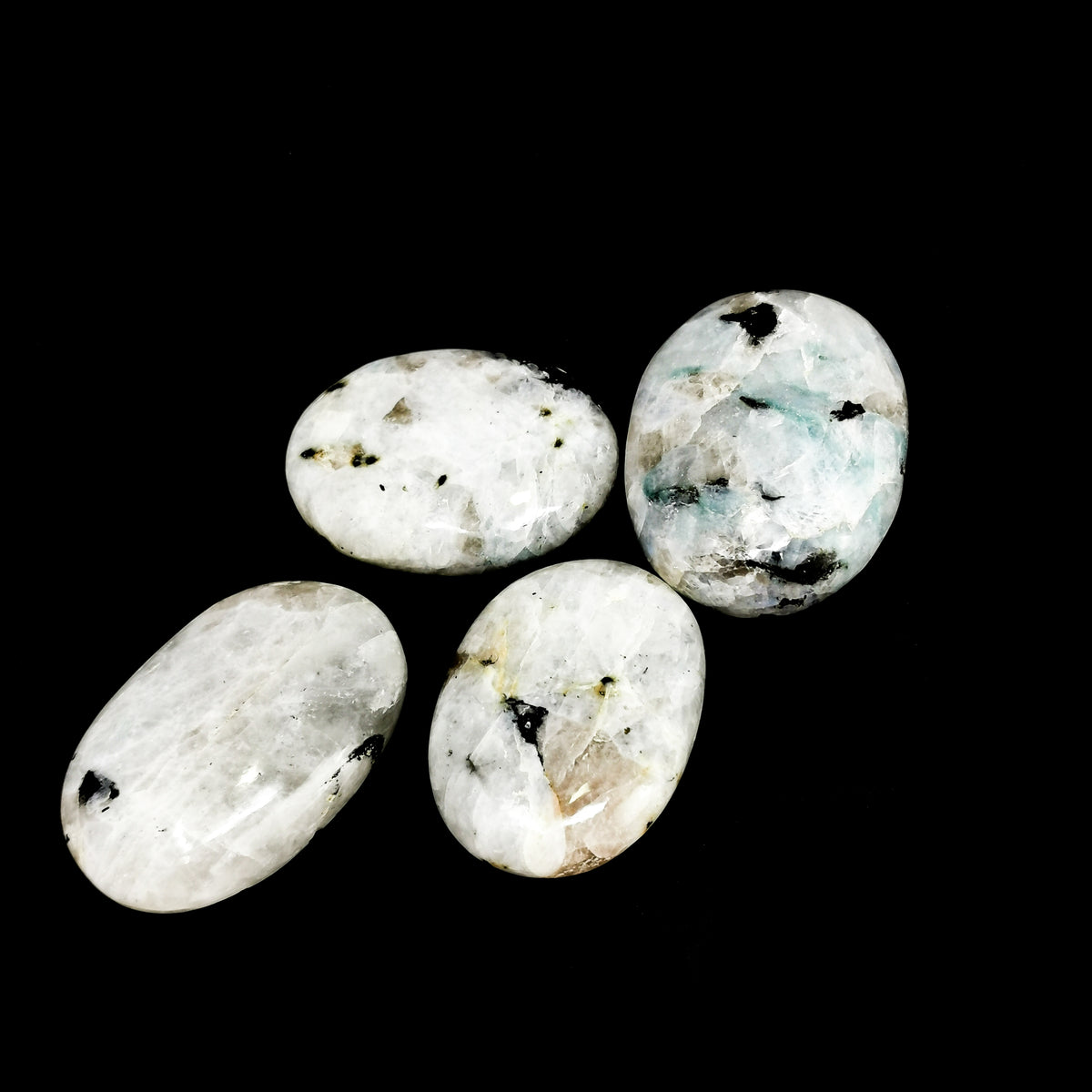 Rainbow Moonstone palm stone, a feldspar.