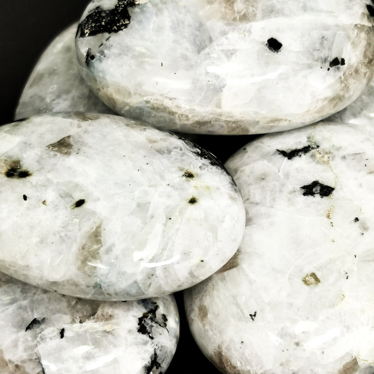 Rainbow Moonstone palm stone, a feldspar.