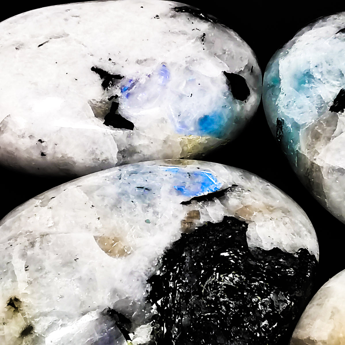 Rainbow Moonstone palm stone, a feldspar.