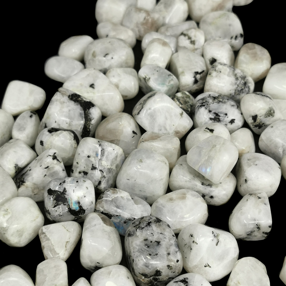 Rainbow Moonstone tumble, a feldspar, from India.
