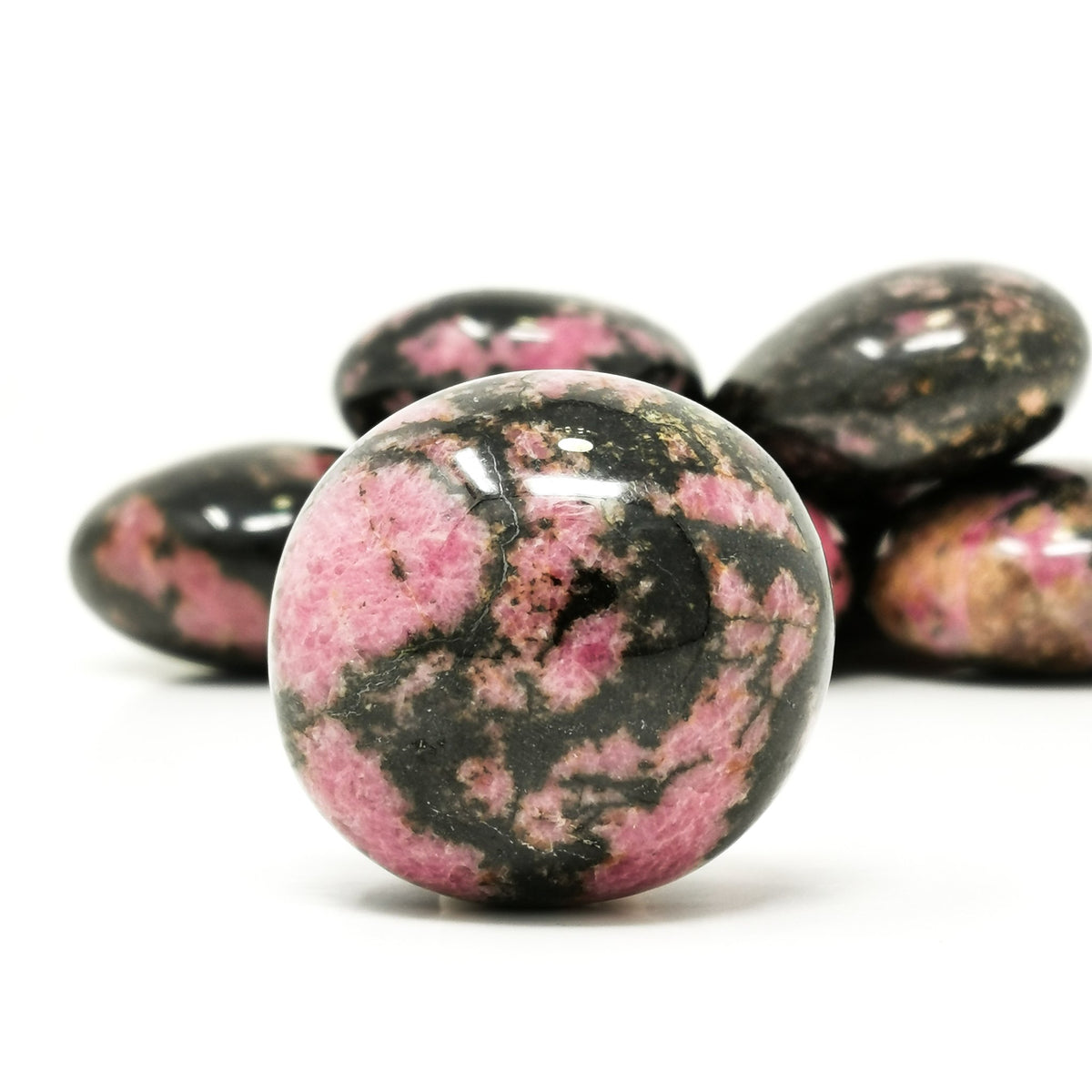 Rhodonite palm stone, a manganese silicate, from Ampanihy, Atsimo-Andrefana, Madagascar.