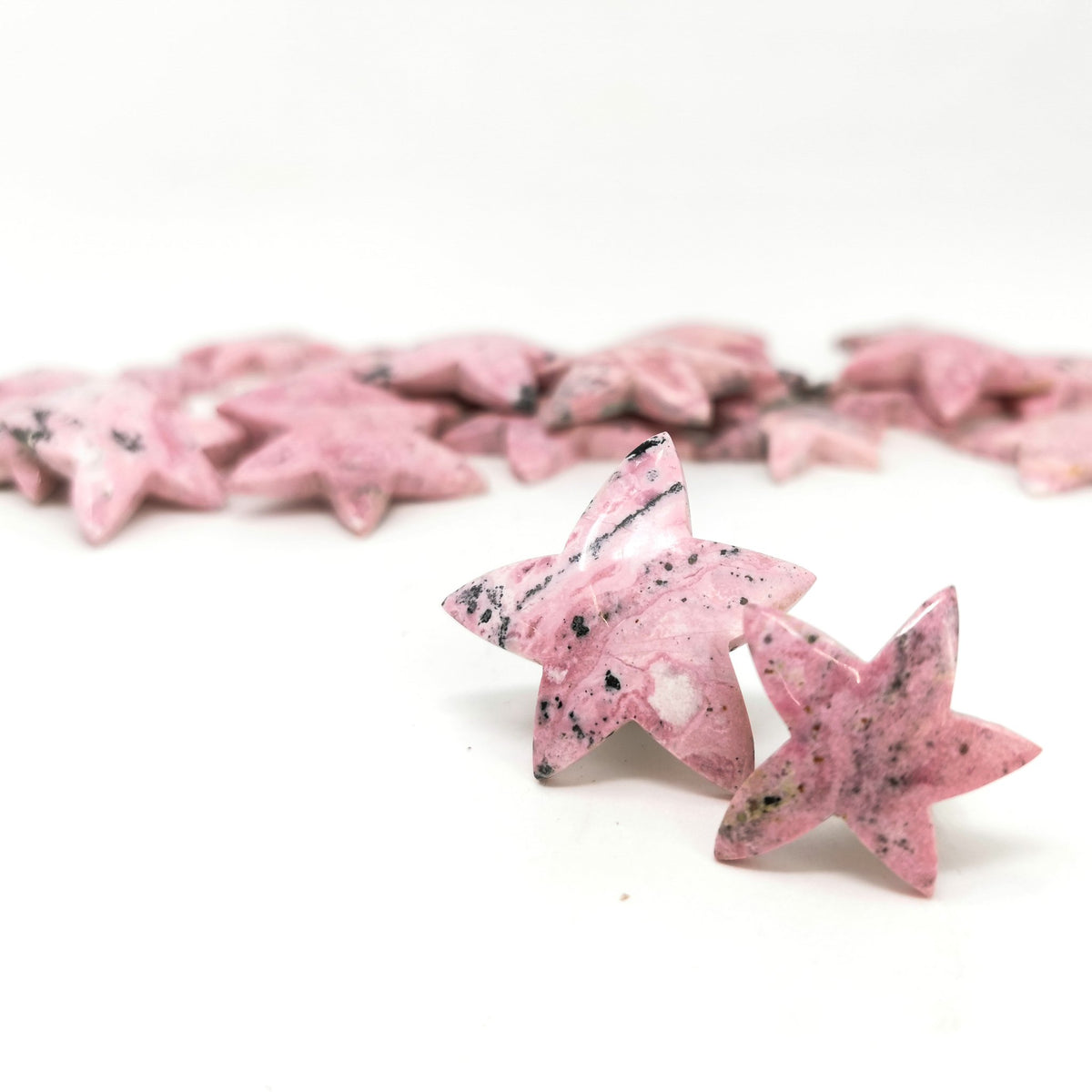 Rhodonite star, a manganese silicate, from Peru.