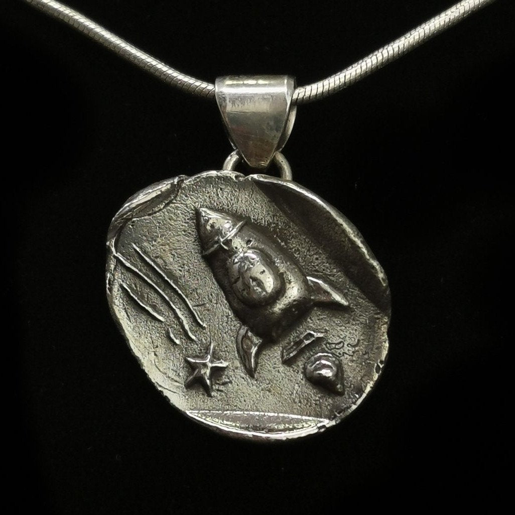 Rocket Ship & Shooting Star pendant in oxidized sterling silver.