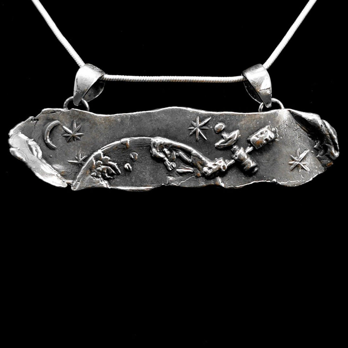 Satellite Over Earth pendant in oxidized sterling silver.