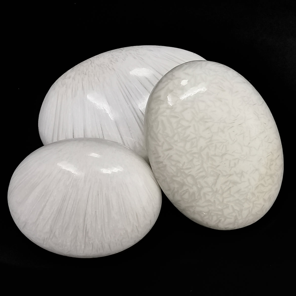 Scolecite palm stone from India.