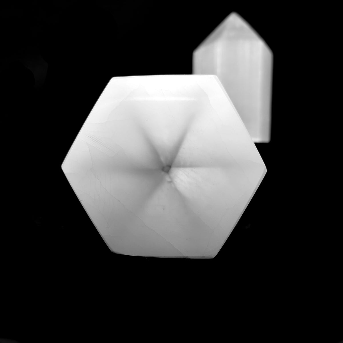 Selenite point, a variety of gypsum, from Morocco.