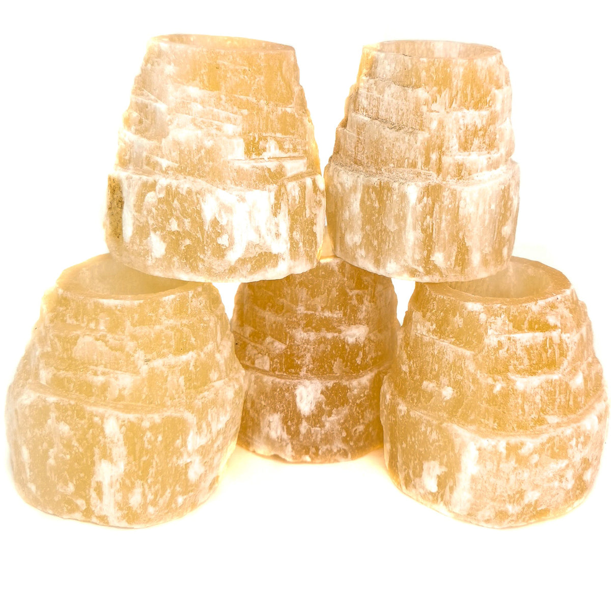 Red Selenite candle holder, a variety of gypsum, from Morocco.