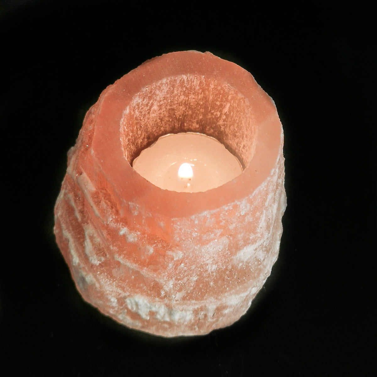 Red Selenite candle holder, a variety of gypsum, from Morocco.